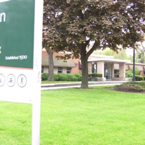 Avalon Park sign and field house entrance.