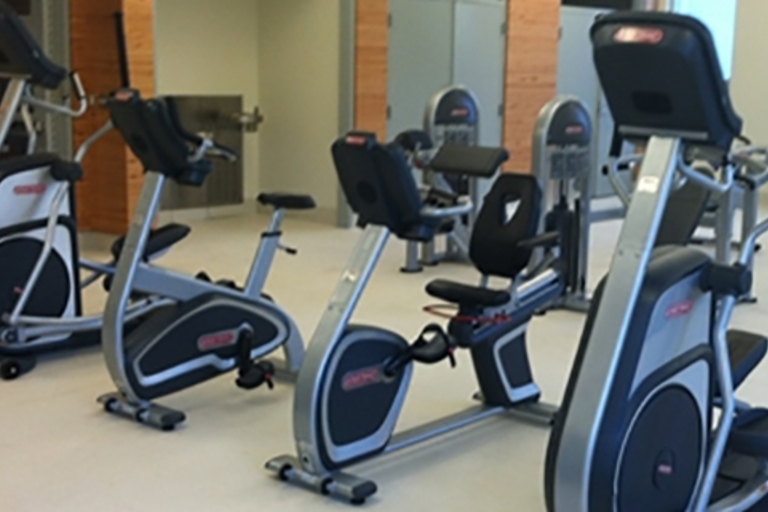 Various exercise bikes in a fitness room.
