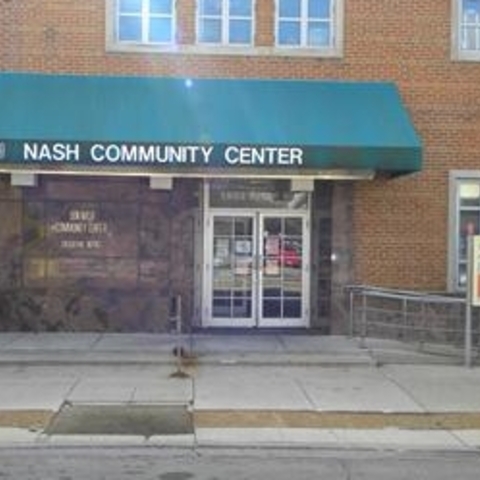 Entrance to Nash Community Center with green awning.