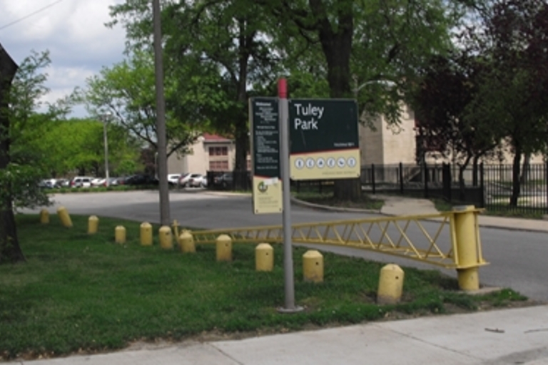 Tuley Park entrance with a yellow gate.