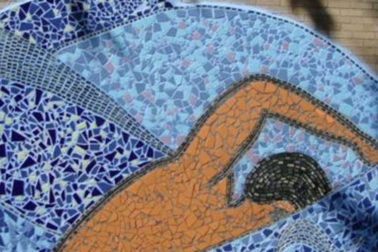 Mosaic of a swimmer in blue and orange.