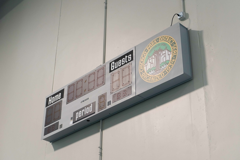 Scoreboard displaying "Home" and "Guests" scores, period, and the Chicago Park District seal.