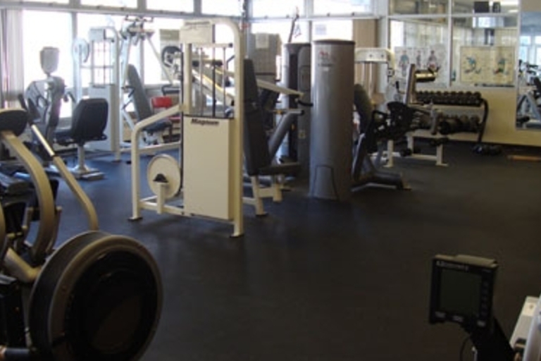 Fitness center with various exercise machines.