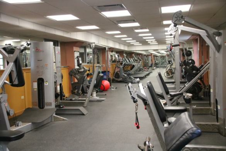 Fitness center with various exercise machines.