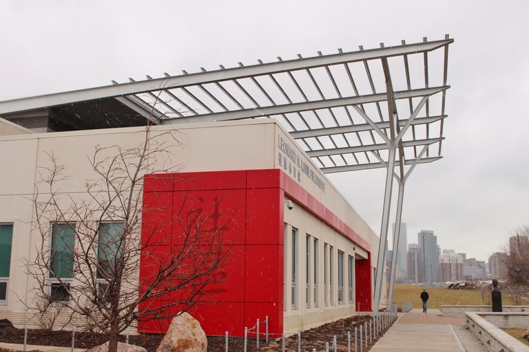 Leonard Louie Fieldhouse exterior with light snow falling.