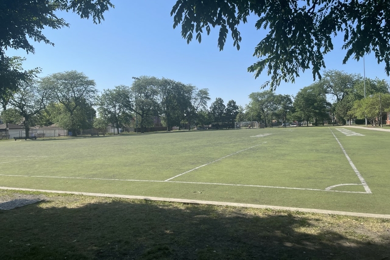 Empty soccer field on a sunny day.