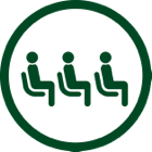 Three people seated in chairs.
