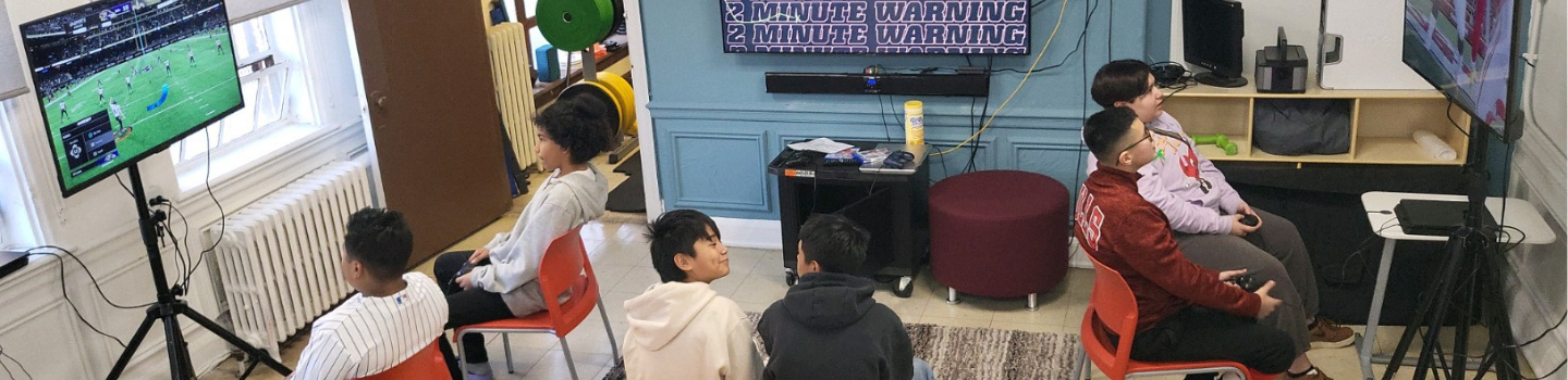 Teens playing video games.